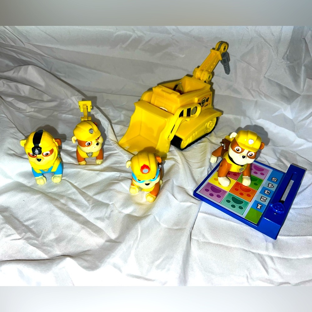 Rubble the “super pup” paw patrol bundle bulldozer action pack boogie board sea